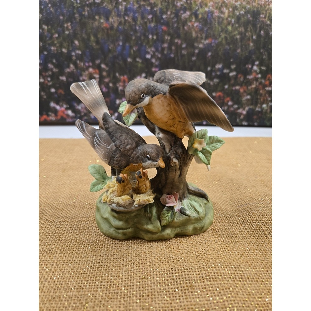 Robin bird family figurine.